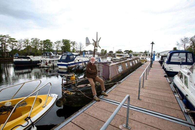 Finian Coghlan at Athlone Marina by his beloved narrowboat Lord Jim. Picture: Paul Molloy