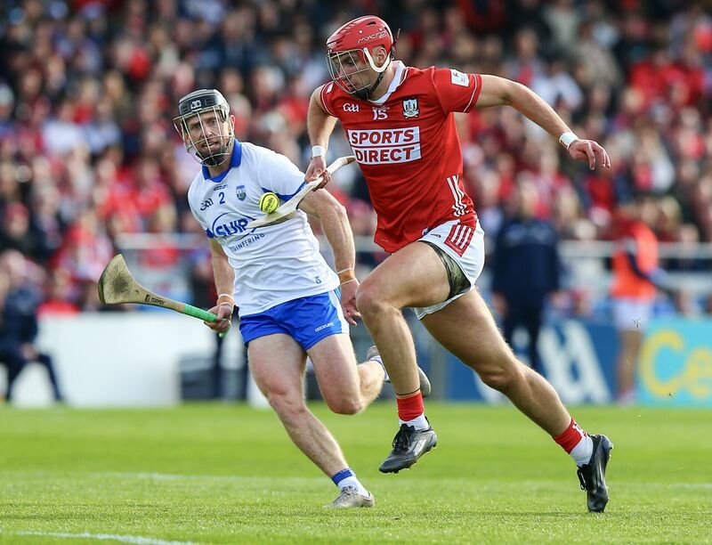 Cork's Brian Hayes drives past Waterford's Ian Kenny. Picture: INPHO