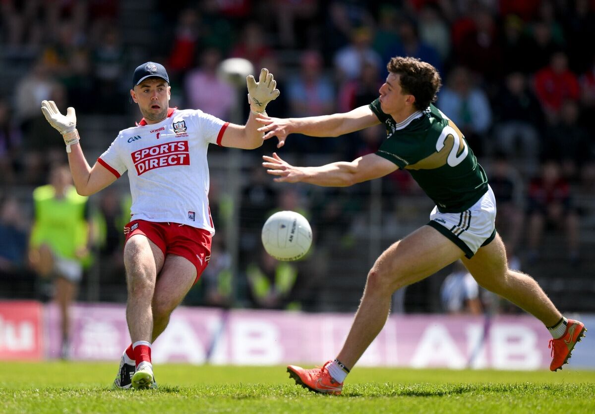 Cork goalkeeper Patrick Doyle clears under pressure from Tomás Kennedy. Picture: Brendan Moran/Sportsfile