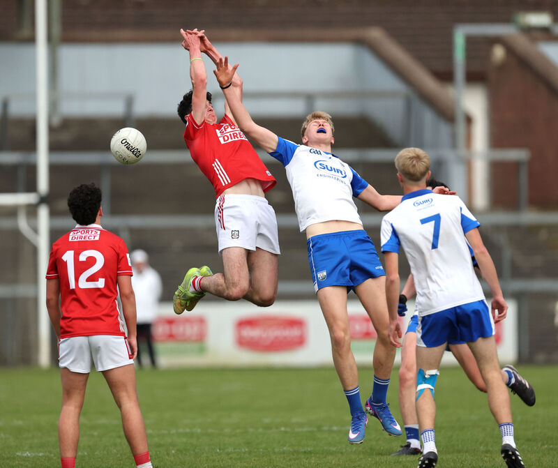  Kieran O'Shea, Cork, Tomás Walsh, Waterford, battle for the high ball. Picture: Jim Coughlan