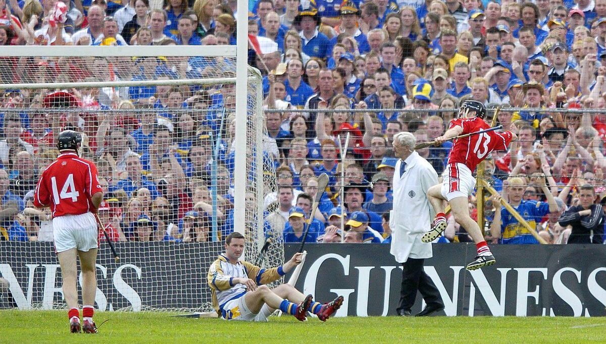 Ben O'Connor of Cork celebrates scoring his side's second goal past a grounded Tipperary goalkeeper Brendan Cummins in the 2006 Munster SHC final at Semple Stadium in Thurles - it's 20 years since the counties last met in the provincial decider. Picture: Brendan Moran/Sportsfile