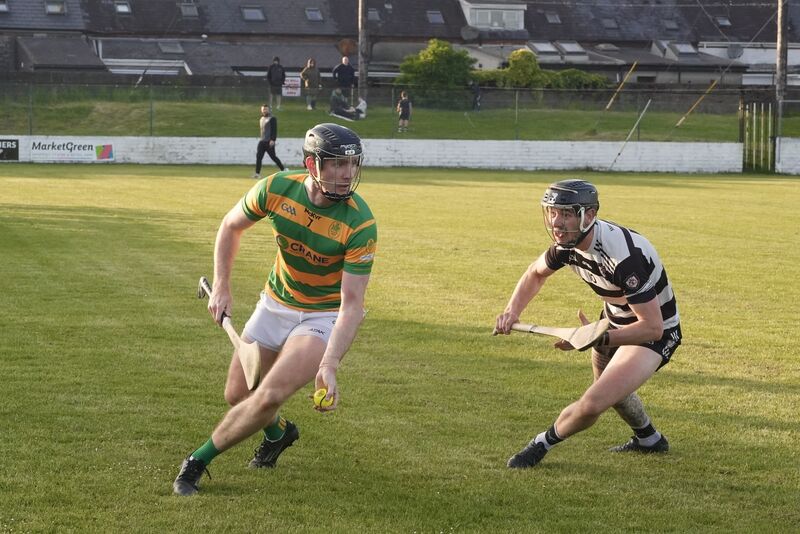 Blackrock’s Mark O’Keeffe takes on Midleton’s Ross O’Regan. Picture: Noel Sweeney