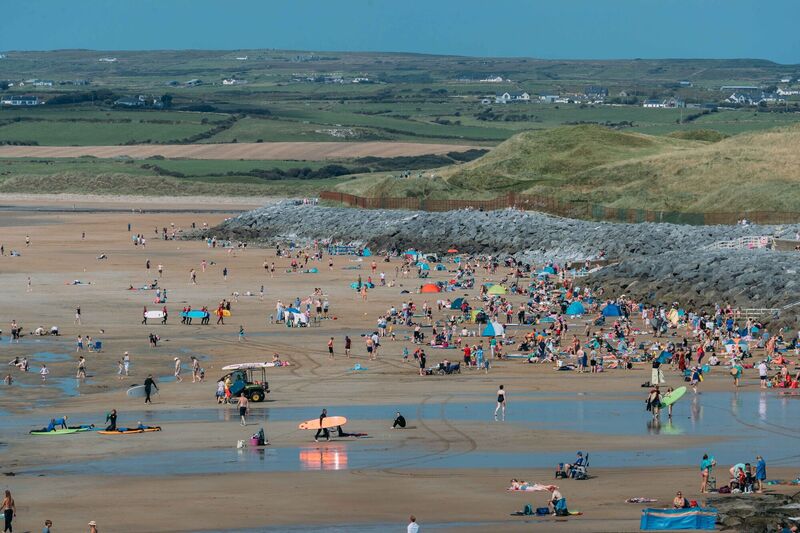  People enjoying the hot weather at Lahinch Co Clare. File picture: Eamonn Ward