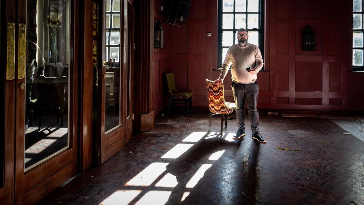 Paul O’Dea casts a shadow across the upper bar during renovation work of The South Gate Bar, formerly the Flying Enterprise, which reopened in March. Picture Chani Anderson