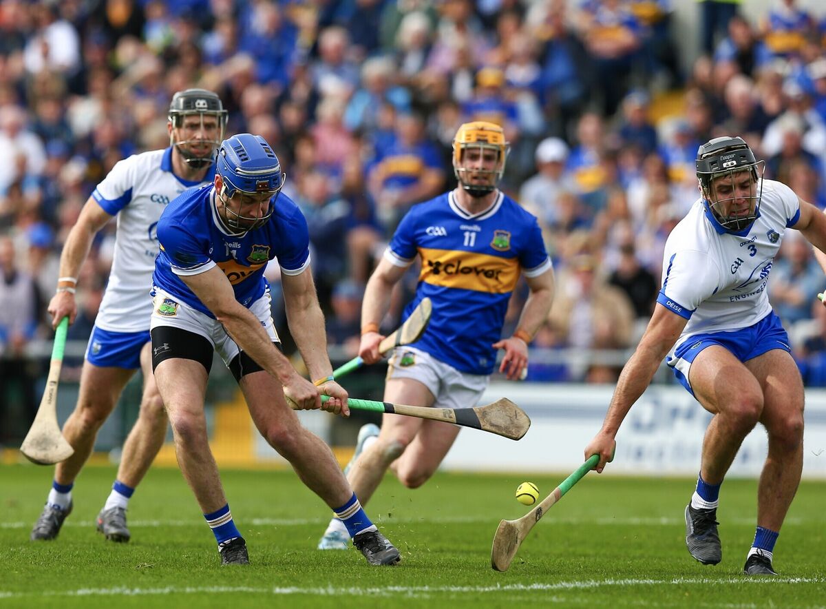 Tipperary's John McGrath and Waterford's Mark Fitzgerald. Pic: ©INPHO