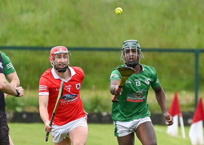  Charleville's Brian O'Connell in a race for possession with Killeagh's John Ogbebor. Picture: David Keane