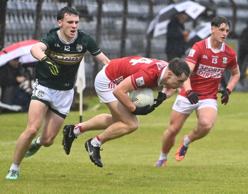 Cork's Jacob Barry is fouled by Kerry's Daithí Laide. Picture: Eddie O'Hare
