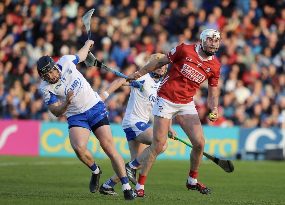 Cork's Tim O'Mahony and Waterford's Darragh Lyons. Picture: ©INPHO