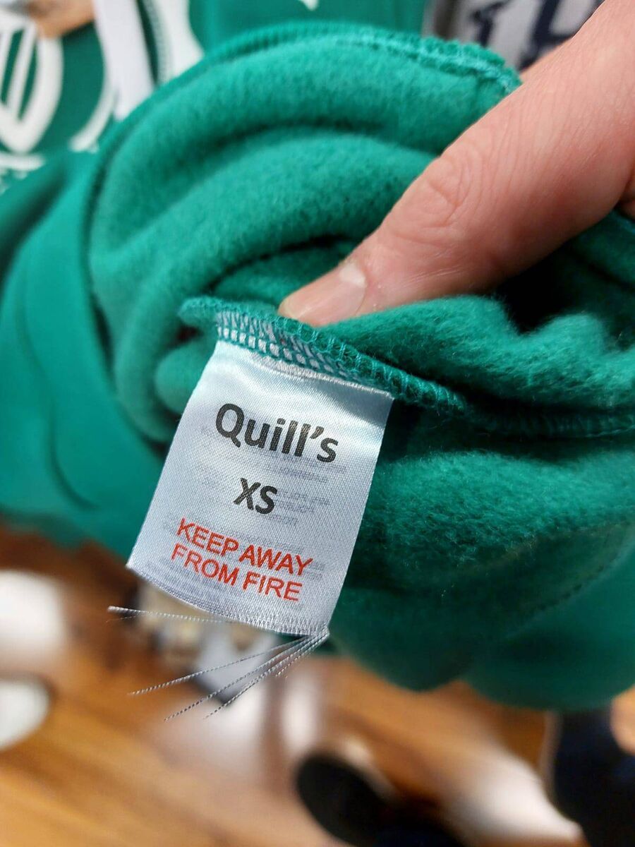 Sweatshirts with Quills-branded swing labels that said, ‘Made in Ireland’ that still had the original label showing the country of origin as Pakistan, not Ireland. 