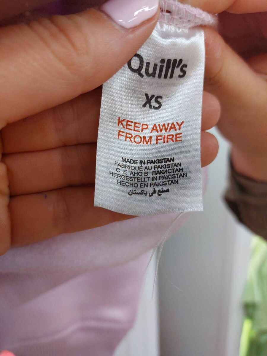 Sweatshirts with Quills-branded swing labels that said, ‘Made in Ireland’ that still had the original label showing the country of origin as Pakistan, not Ireland. 