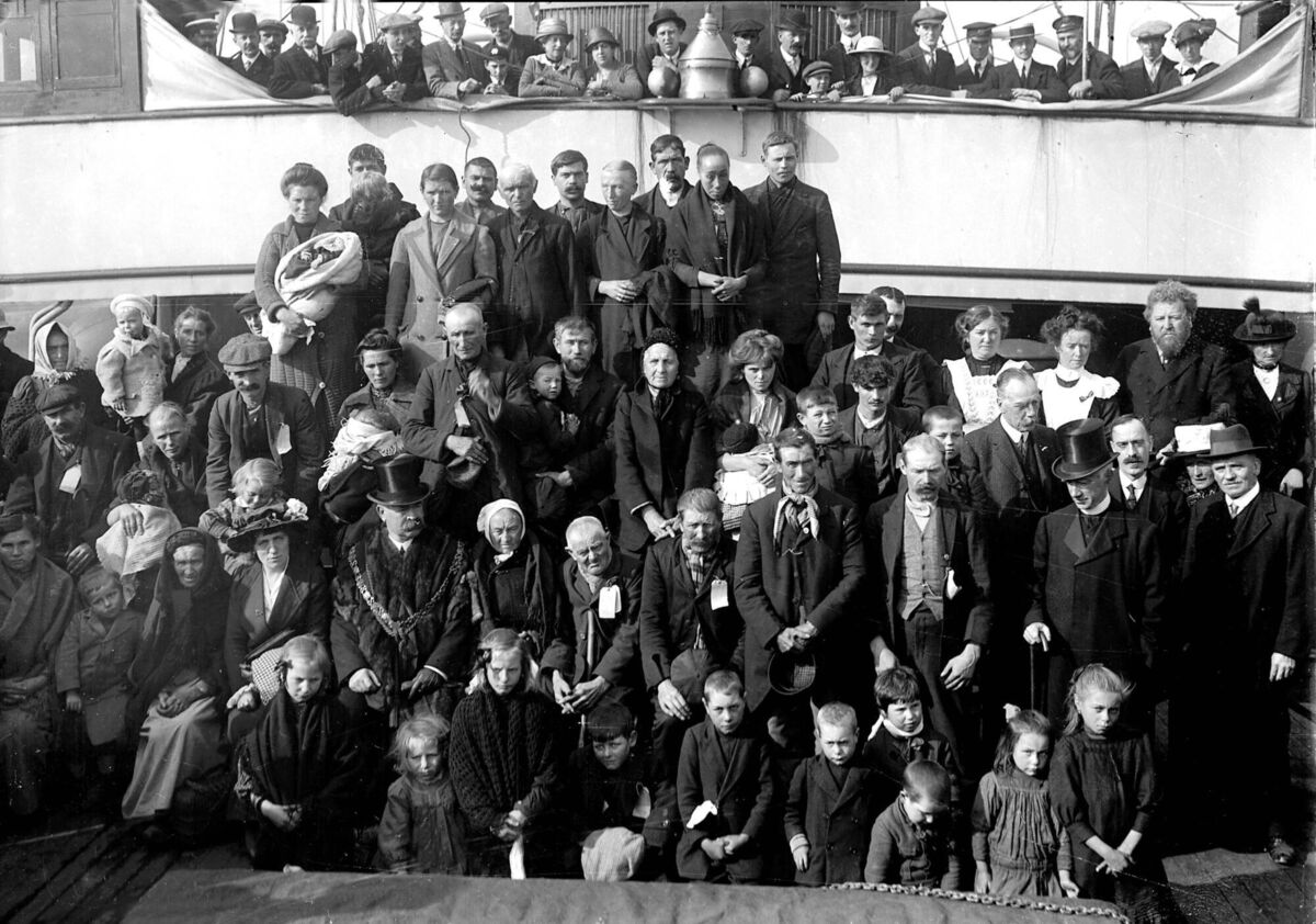 Lord mayor Henry O'Shea with Belgian war refugees in Cork in September 1914. O'Shea himself had emigrated from Ireland to the US and returned, building up a bakery business. The storied Cork nightclub Sir Henry's was named after him. Picture: Irish Examiner Archive