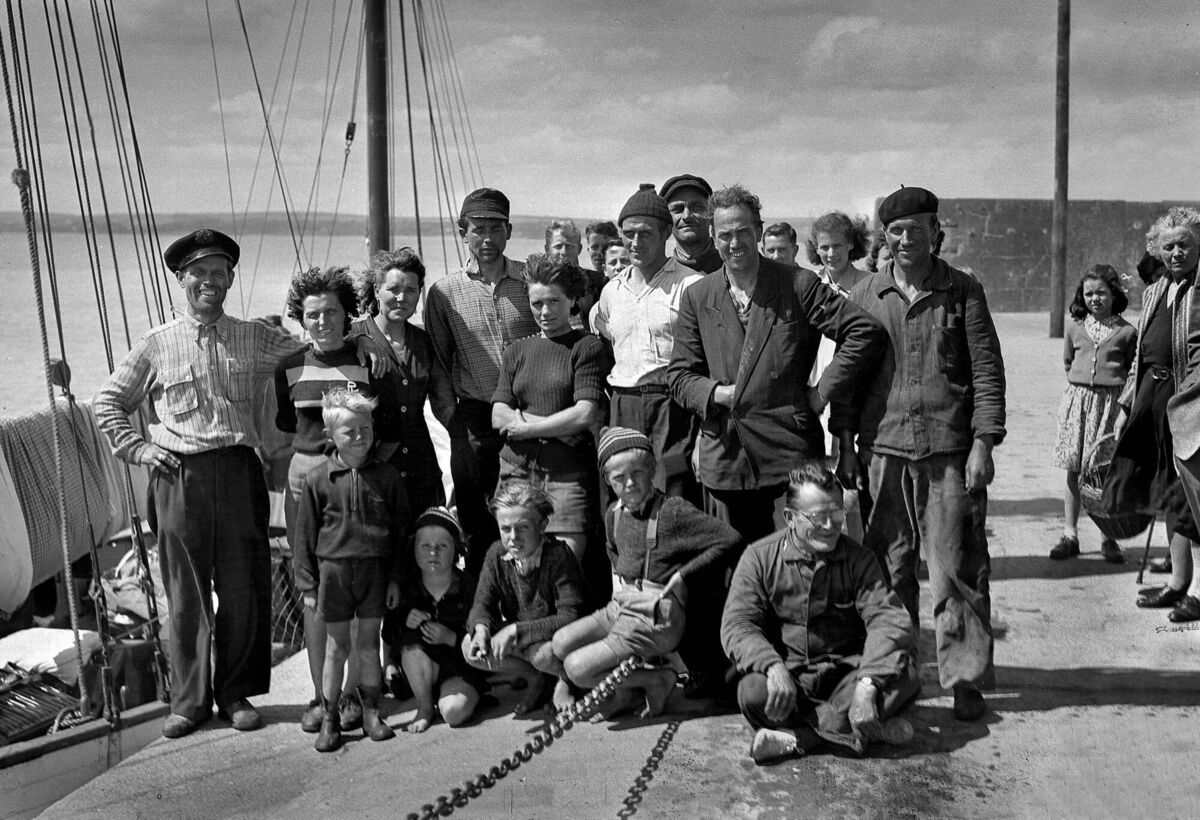 Walter Kunath and other refugees on Ballycotton pier in East Cork having sailed from Germany on board the Sea Wolf in June 1951. Picture: Irish Examiner Archive
