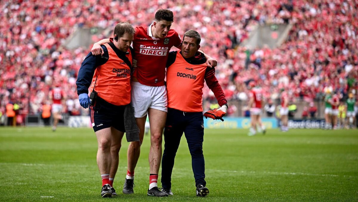 Robert Downey went of injured during Cork's Muntser SHC victory over Limerick. Pic: Seb Daly/Sportsfile