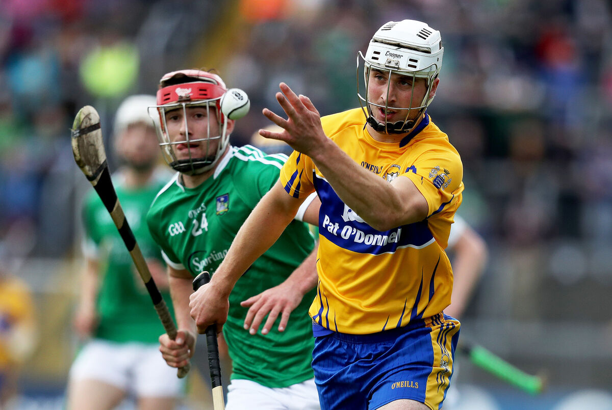 Clare's Patrick O'Connor with Barry Nash of Limerick. Pic:©INPHO/Tommy Dickson