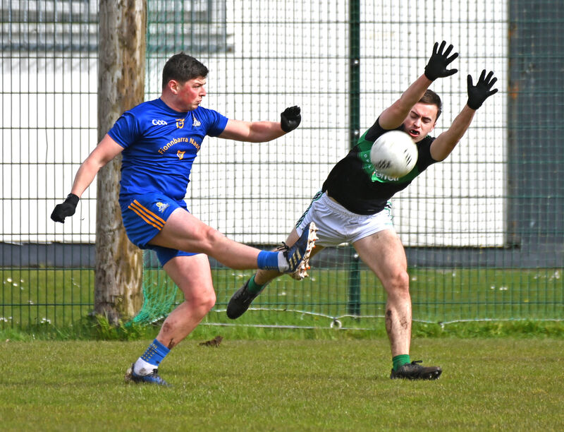 St Finbarr's Cillian Myers-Murray shoots from Nemo Rangers' Eoin Nation. Picture: Eddie O'Hare