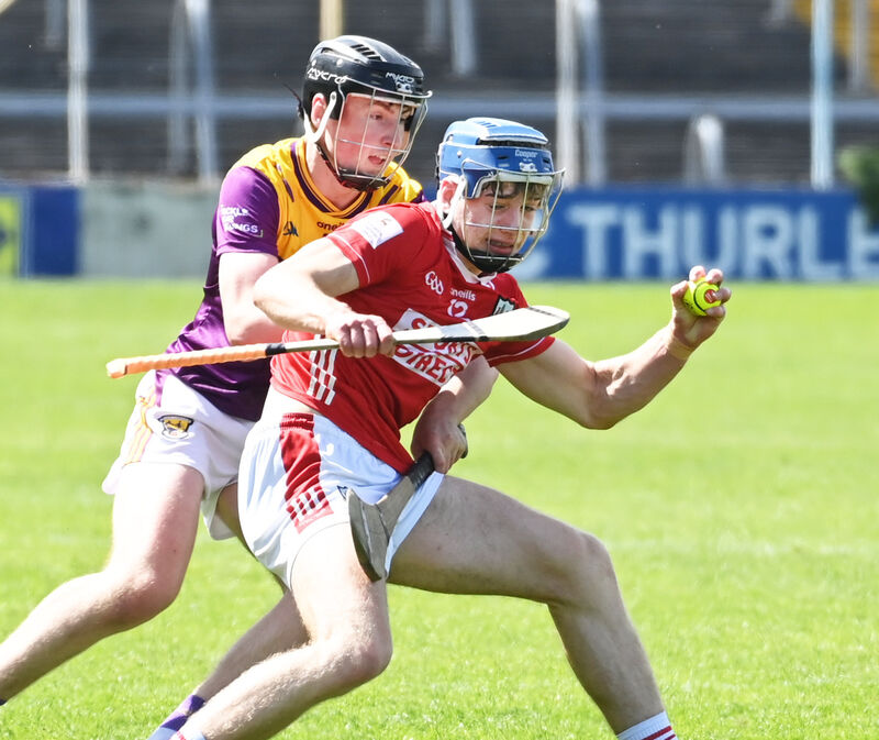Cork's Calllum Coffey tries to hold off Wexford's Ryan Walsh. Picture: Eddie O'Hare