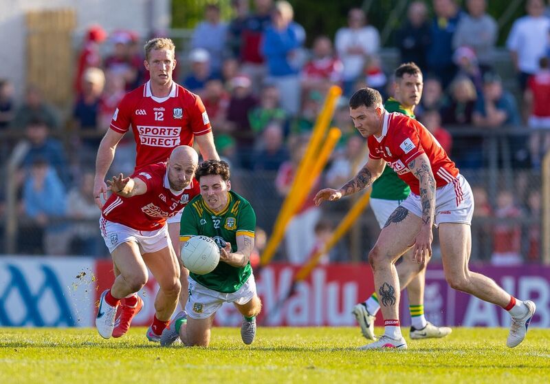 Meath's James Conlon under pressure from Brian O'Driscoll of Cork. Picture: INPHO/Tom O'Hanlon