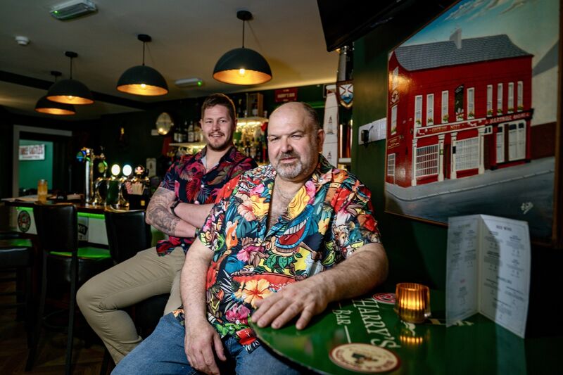 Jacques Koster and owner Graham D’Alton pictured together inside Harry’s Bar in Kinsale. Picture: Chani Anderson