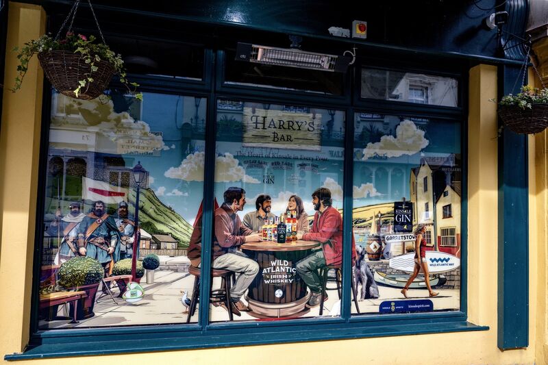 Exterior view of Harry’s Bar in Kinsale, a colourful and welcoming pub. Picture Chani Anderson