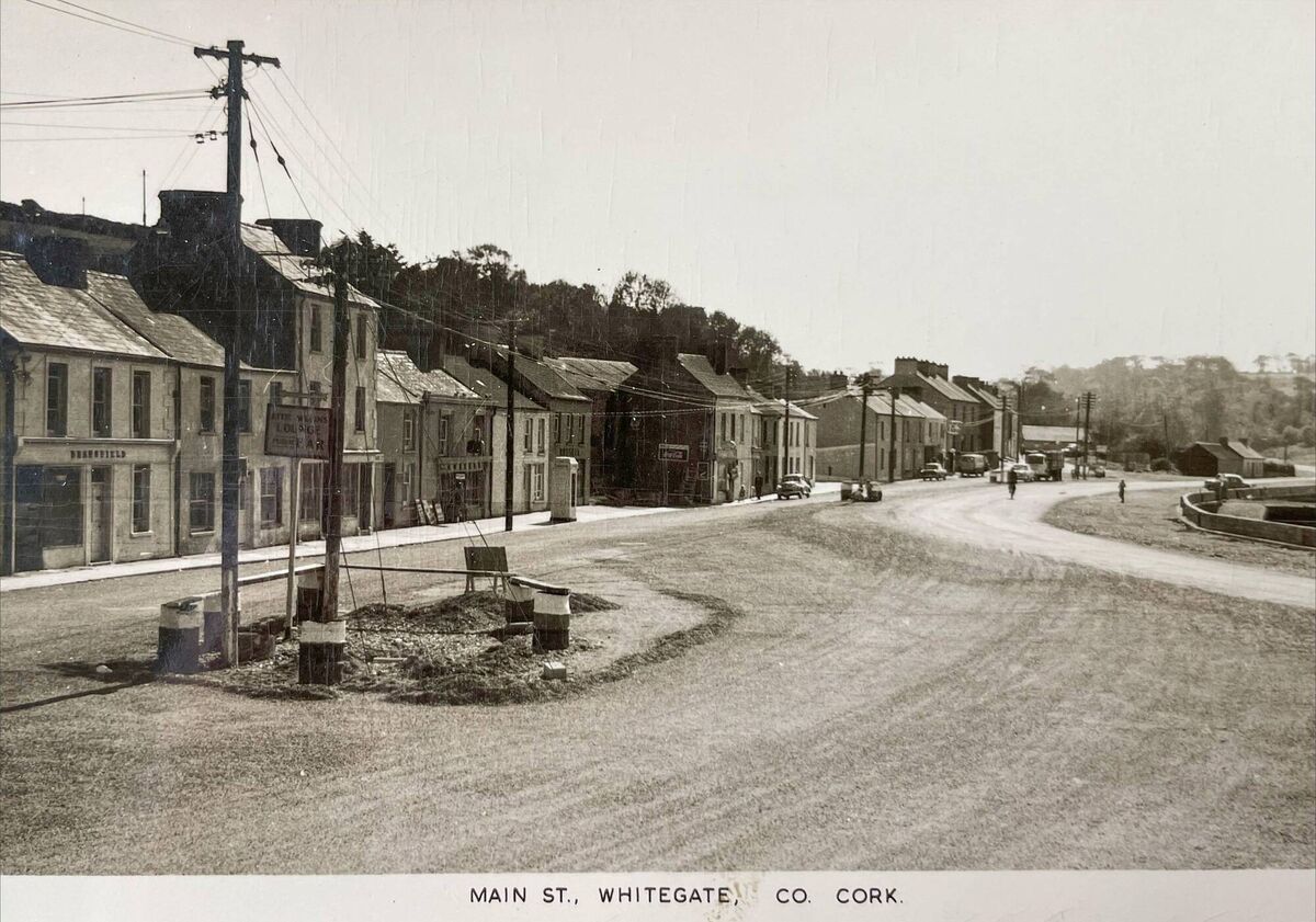 A postcard depicting the main street in Whitegate, Co Cork, as it was remembered by Micheál Kenefick