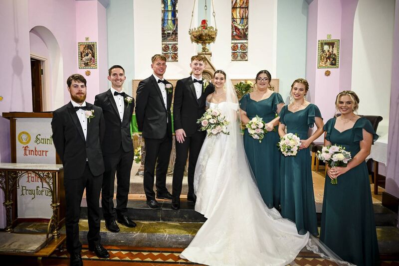 Elisabeth Villa and Anthony McSweeney with their wedding party. Pictures: John Sexton Photography 