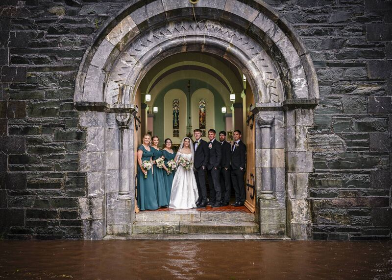 Elisabeth Villa and Anthony McSweeney with their wedding party. Pictures: John Sexton Photography 