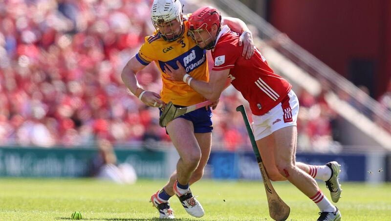 Clare's Adam Hogan battles with Alan Connolly of Cork. Picture: INPHO/Tom O'Hanlon