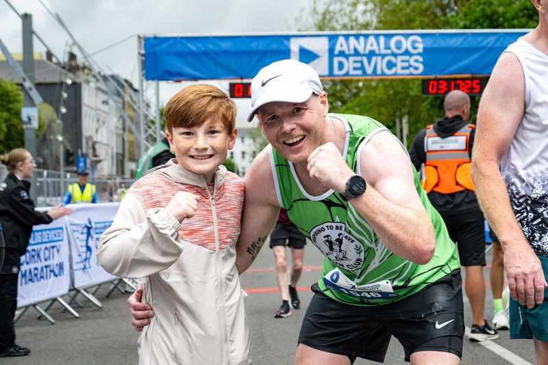 Robert and Harry Taffe at the marathon. Picture: Chani Anderson.