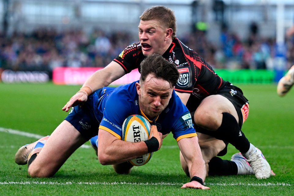 Hugo Keenan scores Leinster's third try despite the tackle of Morne van den Berg. Photo: Brendan Moran/Sportsfile