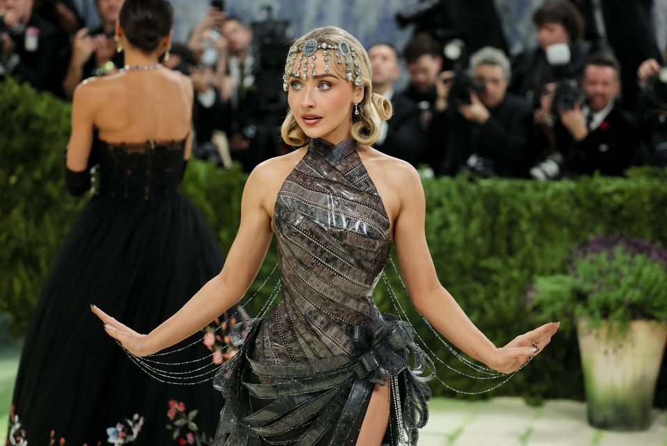 Sabrina Carpenter poses during the Met Gala, an annual fundraising gala held for the benefit of the Metropolitan Museum of Art's Costume Institute with this year's theme 'Costume Art' in New York City, New York, U.S., May 4, 2026. REUTERS/Daniel Cole