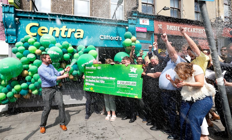 Staff at Centra on Shandon Street, Cork, celebrate selling a winning €250m EuroMillions ticket last June. Photograph: Mac Innes Photography