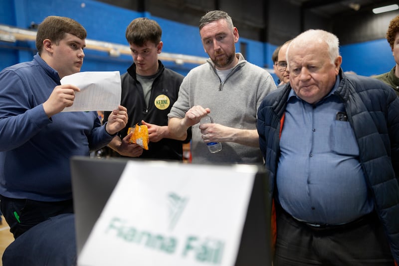 Galway mayor Mike Cubbard (C) watches counting begin tallies centre at the Lawn and Tennis Club in Salthill. Photograph: Chris Maddaloni/The Irish Times


