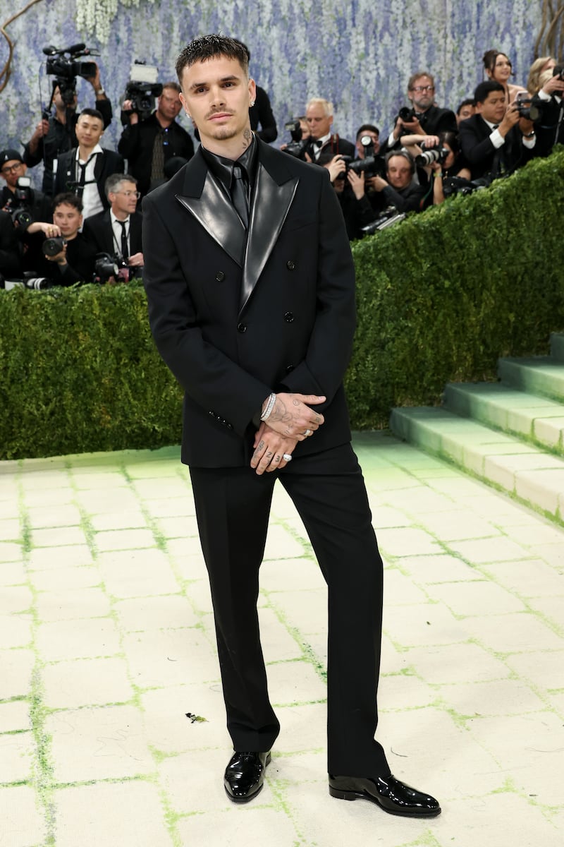 Romeo Beckham in Burberry. Phitograph: Jamie McCarthy/Getty Images)