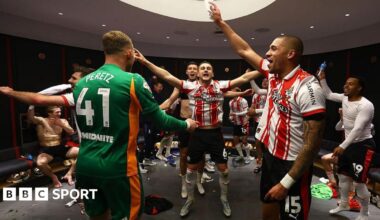 Taylor Harwood-Bellis and his Southampton teammates celebrate in the dressing room after the Championship play-off semi-final win over Middlesbrough