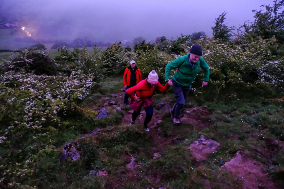A helping hand... walkers make thier way to the top of Sí Bheag Sí Mhór. Photo: David Knight