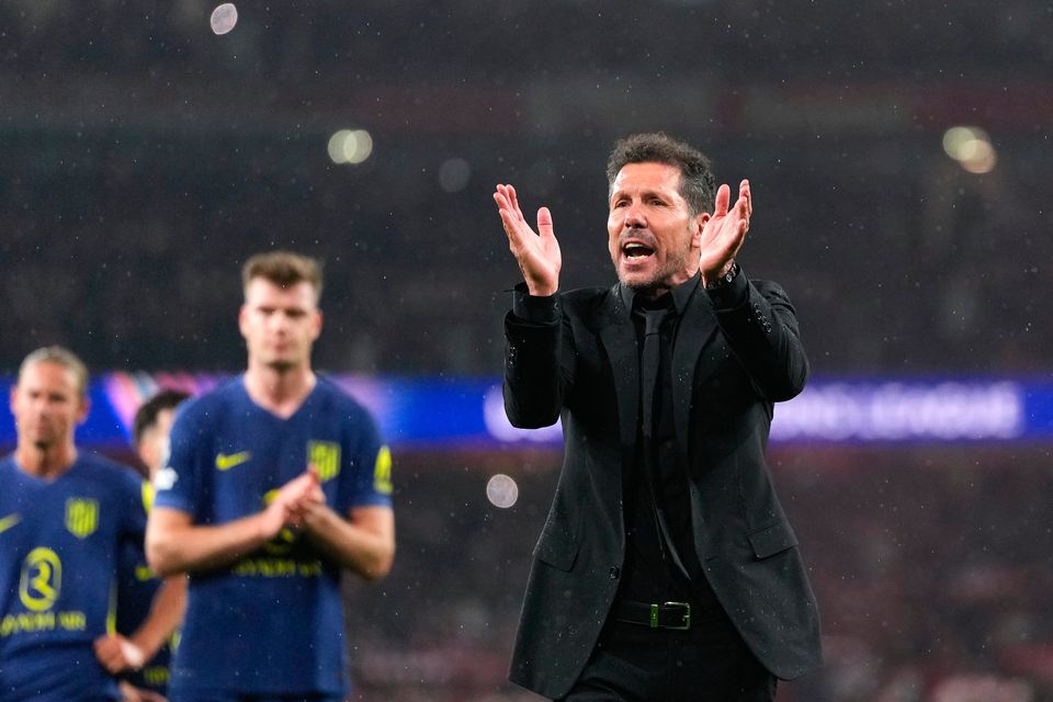 Atletico Madrid's Diego Simeone and the players applaud the supporters at the the end of the Champions League semi-final, second leg in London.