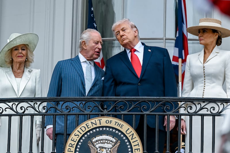 From right: first lady Melania Trump, president Donald Trump, King Charles and Queen Camilla watch a pass in review from a balcony of the White House during an arrival ceremony in Washington, April 28th, 2026. Photograph: Kenny Holston/The New York Times
                      