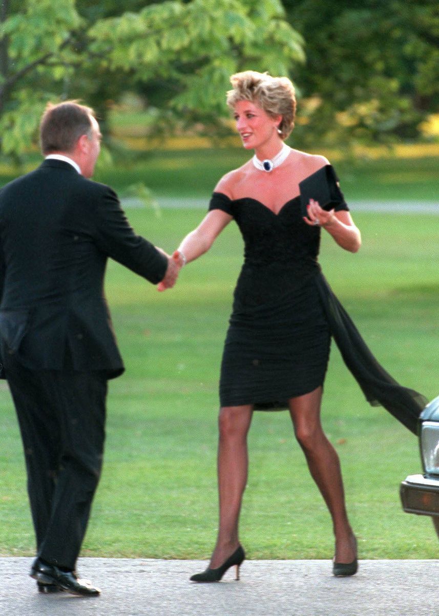 Diana, Princess of Wales, wearing a stunning black dress commissioned from Christina Stambolian, at the Vanity Fair party at the Serpentine Gallery on November 20, 1994 in London