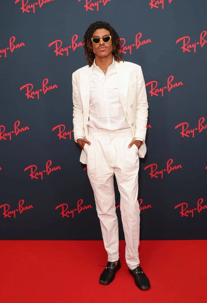 Henry Samuel in a white Dsquared2 suit