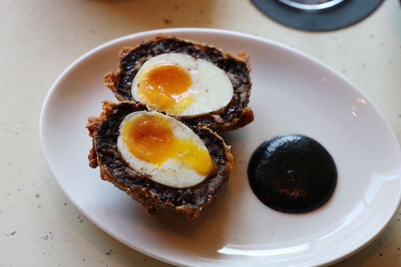 Dirty Auld Scotch Egg wrapped in black pudding at The Libertine. Photograph: Alan Betson