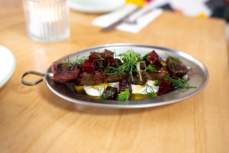 Grilled ox tongue skewer, beets and horseradish cream at Saint Francis Provisions. Photograph: John Allen