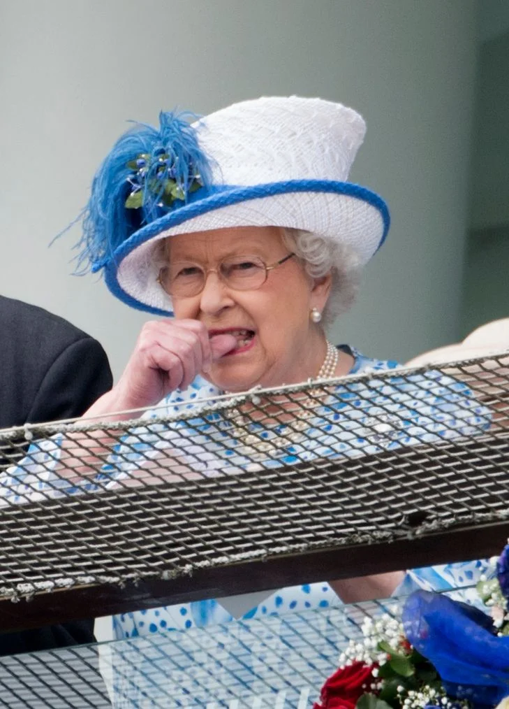 The Queen nervously biting her nails.