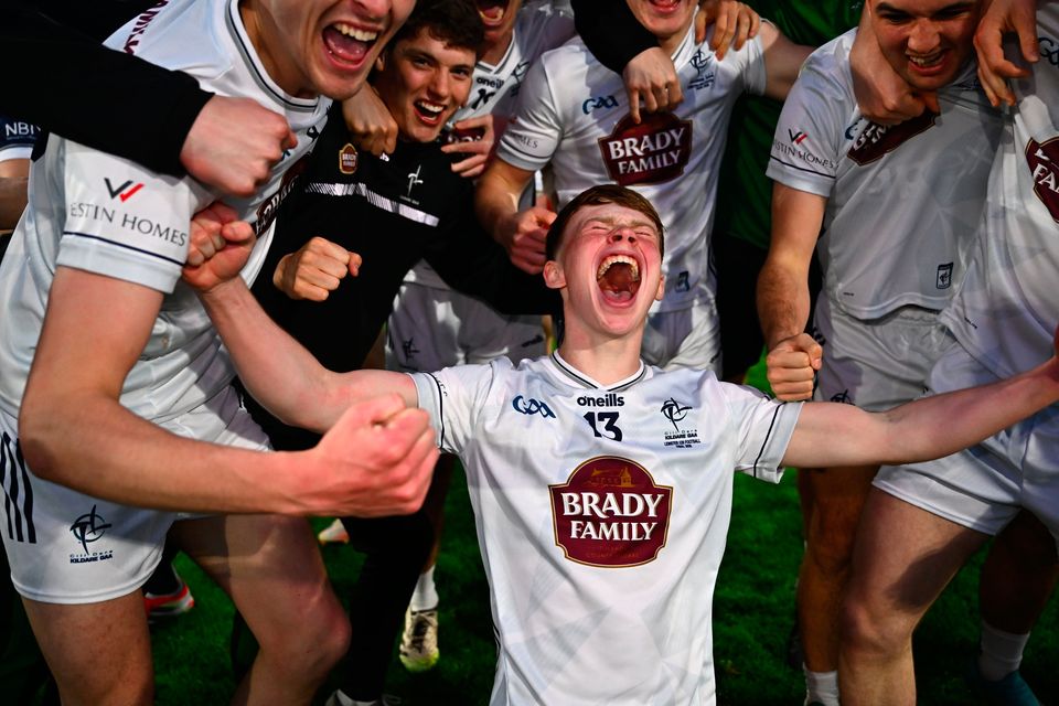 Euan Cowzer of Kildare, centre, celebrates after the Leinster U-20 football final at Parnell Park in Dublin. Photo: Piaras Ó Mídheach/Sportsfile