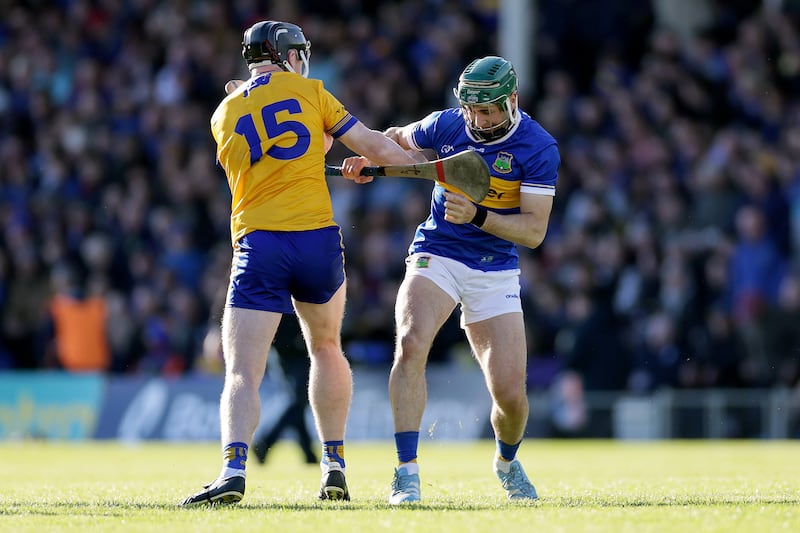 Tempers flare during the game between Clare's Tony Kelly and Robert Doyle of Tipperary. Photograph: Laszlo Geczo/Inpho