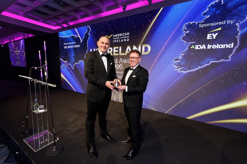 Chamber president Mark Cockerill presents the global leadership award to Graham Abell of Workday. Photograph: Conor McCabe Photography