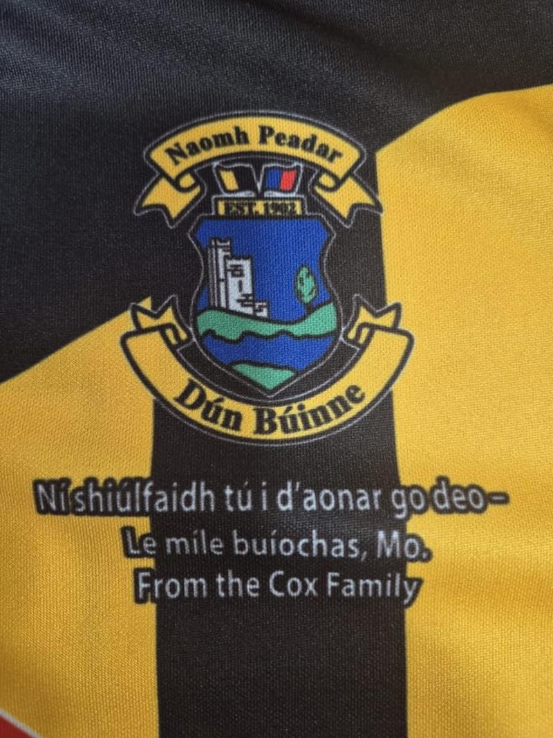 Seán Cox and his family presented a customised Dunboyne GAA jersey with the message 'Ní shiúlfaidh tú i d'aonar go deo' – You'll Never Walk Alone – to Mohamed Salah. Photograph: St Peter's Dunboyne