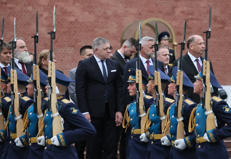 Slovak prime minister Robert Fico attends a wreath-laying ceremony at the Tomb of the Unknown Soldier by the Kremlin Wall in Moscow on Friday. Photograph: Shamil Zhumatov/Pool/AFP via Getty