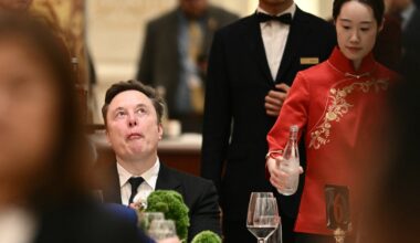 Elon Musk’s awkward selfie moment with rival Chinese billionaire in Beijing – The Irish Times