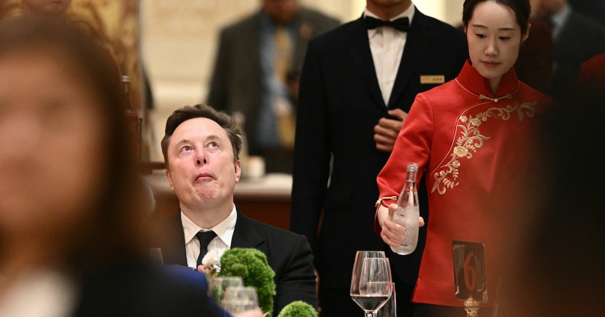 Elon Musk’s awkward selfie moment with rival Chinese billionaire in Beijing – The Irish Times