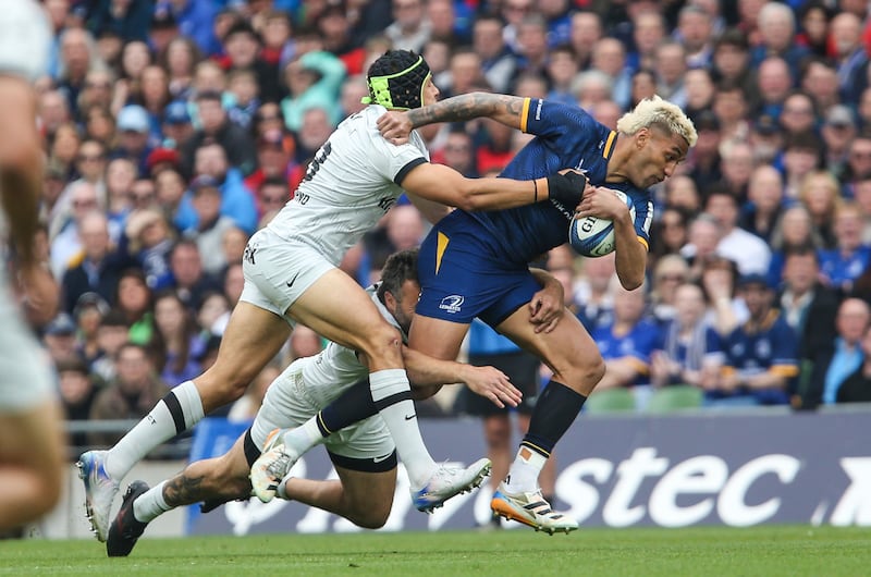 Leinster's Reiko Ione is tackled by Juan Brex of Toulon during the Champions Cup match at the Aviva Stadium on Saturday. Photograph: Getty Images